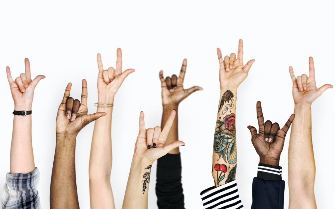 Diversity hands gesturing love sign